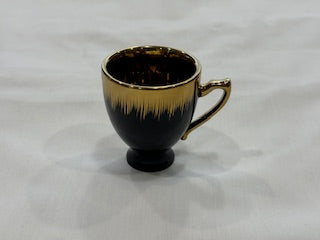 Black and Gold Coffee Cups Circle Plate Drip Design