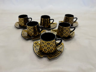 Black and Gold Coffee Cups Fish Shape Plate Circle Design