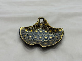 Black and Gold Coffee Cups Fish Shape Plate Circle and Line Design